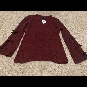 New with tag: Maroon sweater with bows on sleeves